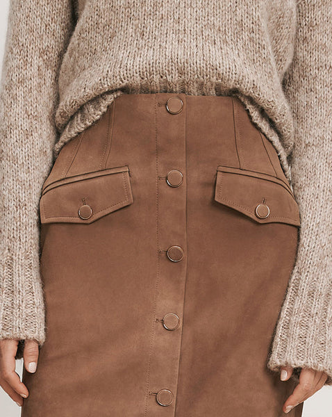Veronica Beard Brown suede button-front midi skirt with flap pockets.