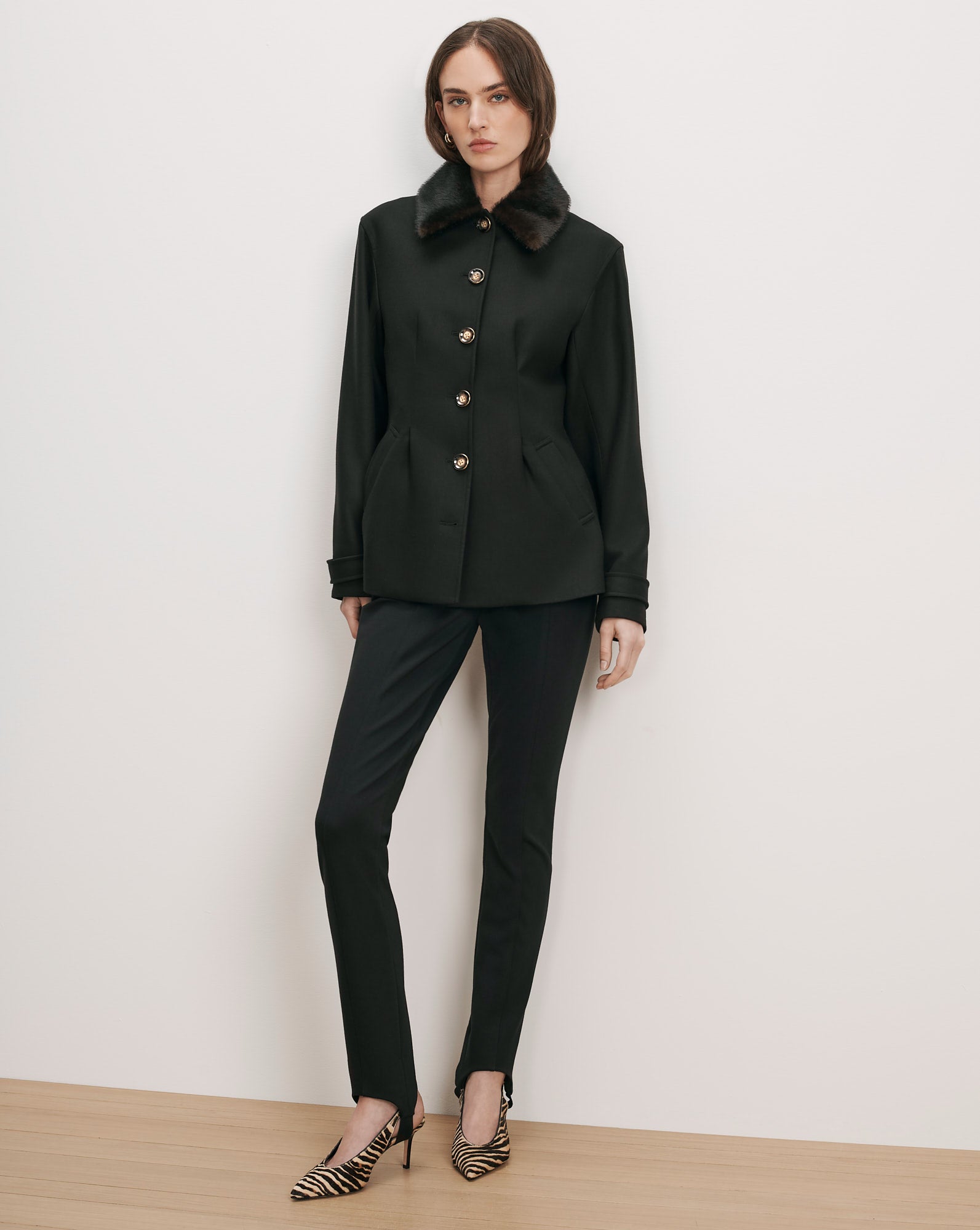 Veronica Beard Black wool jacket with faux fur collar and gold buttons.