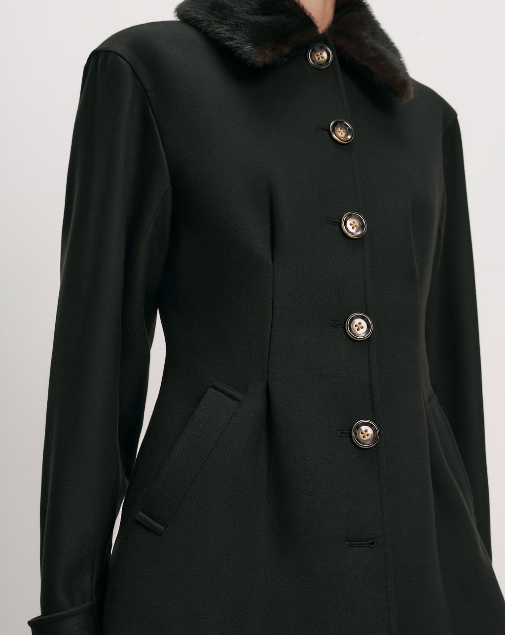 Veronica Beard Black coat with faux fur collar and gold buttons.