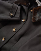 Veronica Beard Black coat with brown faux fur collar and gold buttons.