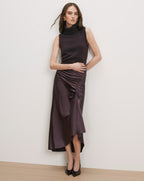 Veronica Beard Purple sleeveless turtleneck and satin ruched skirt.