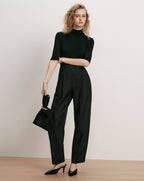 Veronica Beard Black ribbed mock neck top and pleated trousers