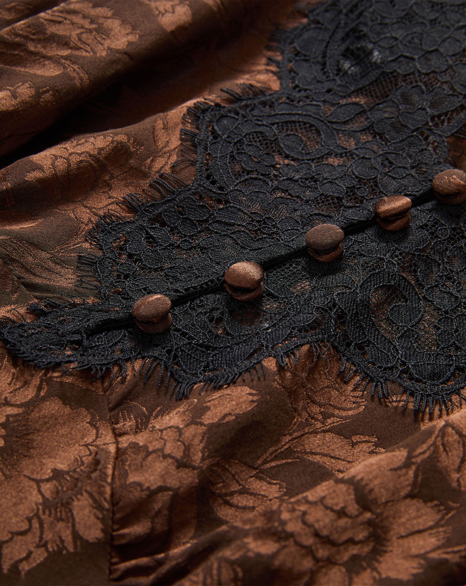 Veronica Beard Brown floral satin garment with black lace trim.