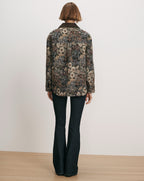 Veronica Beard Floral tapestry jacket with dark wash flare jeans.