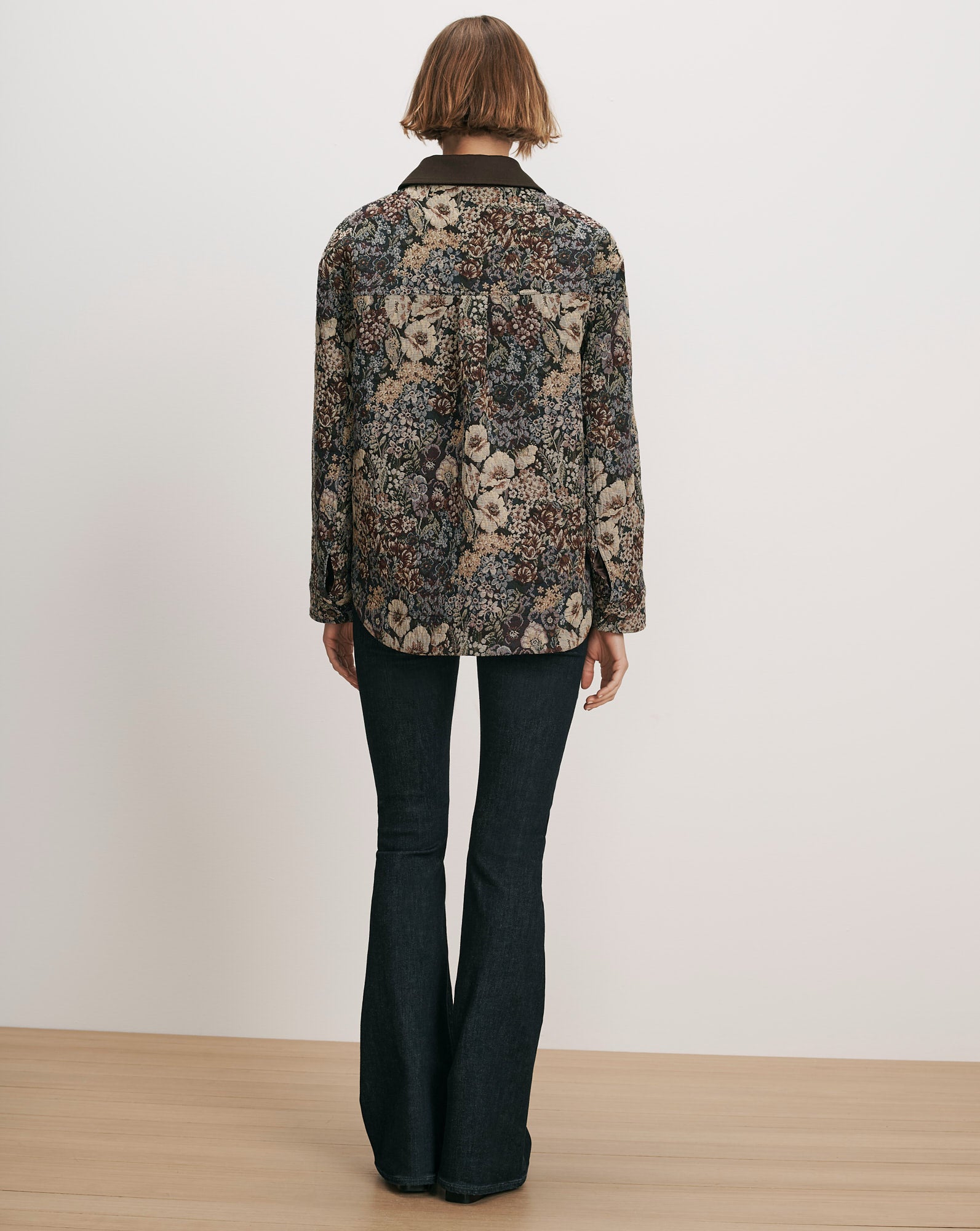 Veronica Beard Floral tapestry jacket with dark wash flare jeans.