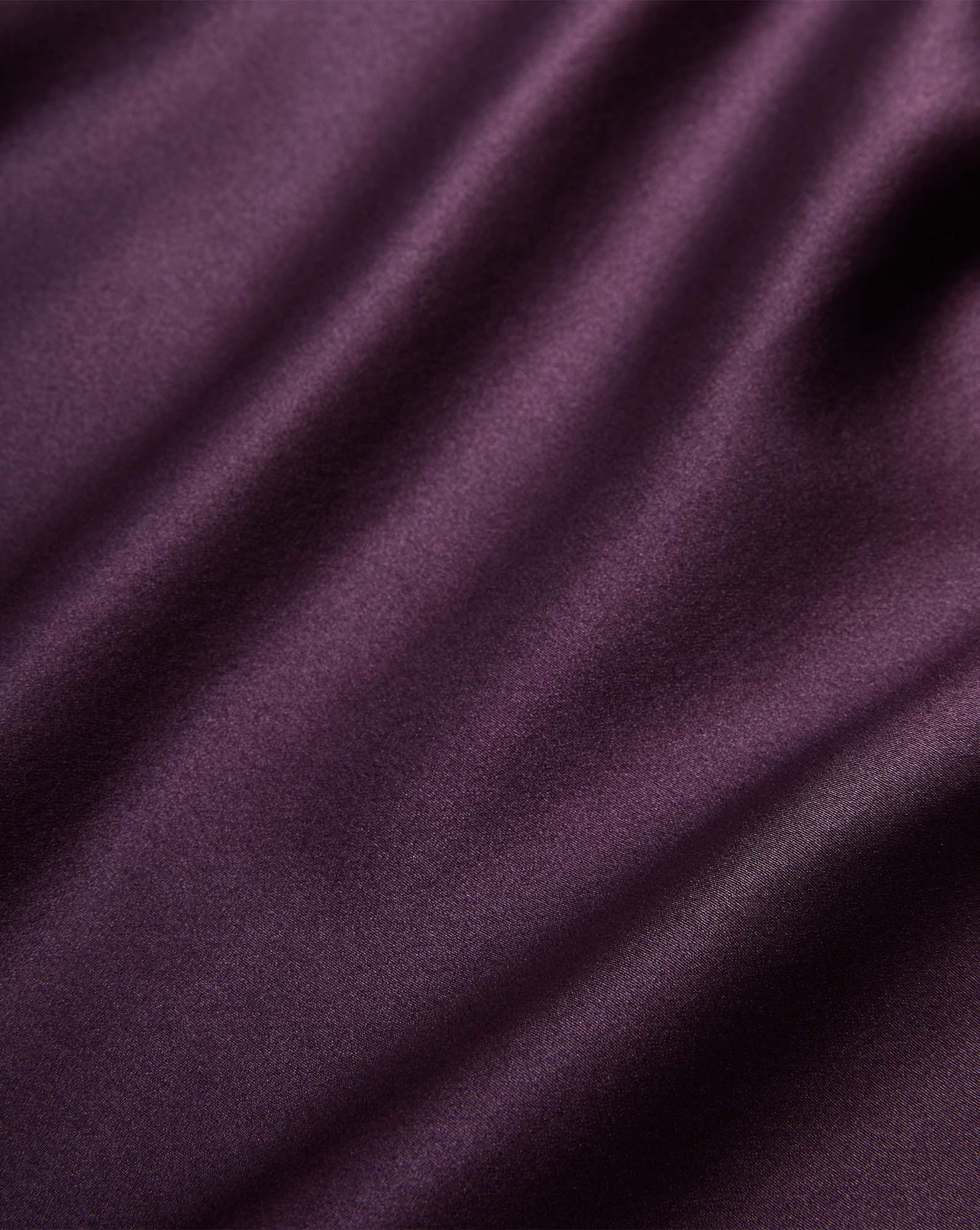 Veronica Beard Purple satin fabric with soft folds.