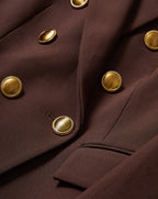 Veronica Beard Brown double-breasted blazer with gold buttons.