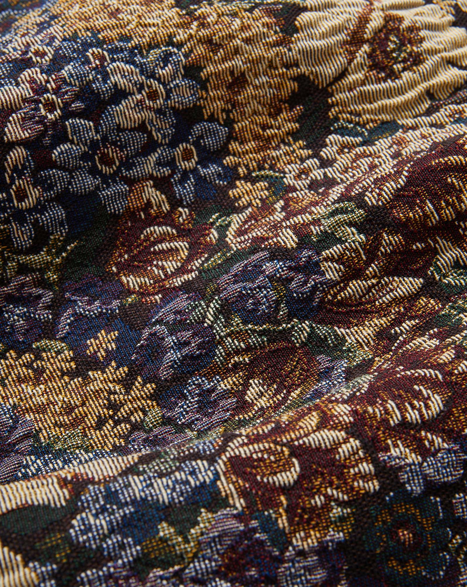 Veronica Beard Jacquard fabric with floral and leaf patterns in muted colors.