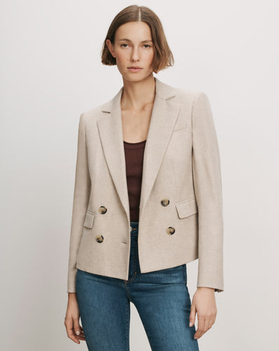 Veronica Beard Beige double-breasted blazer with notched lapels.