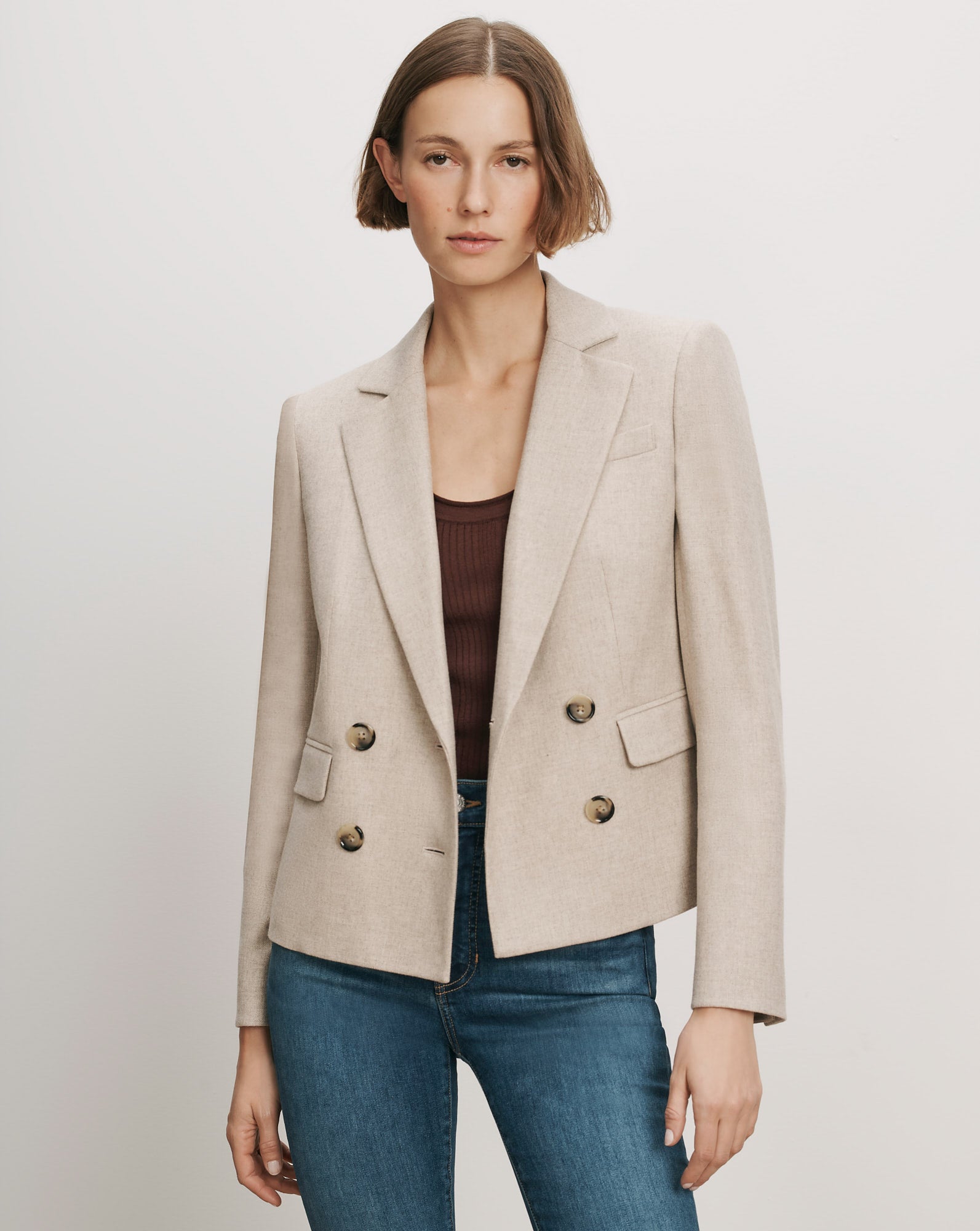Veronica Beard Beige double-breasted blazer with notched lapels.