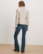 Veronica Beard Beige wool blazer, dark wash flare jeans.