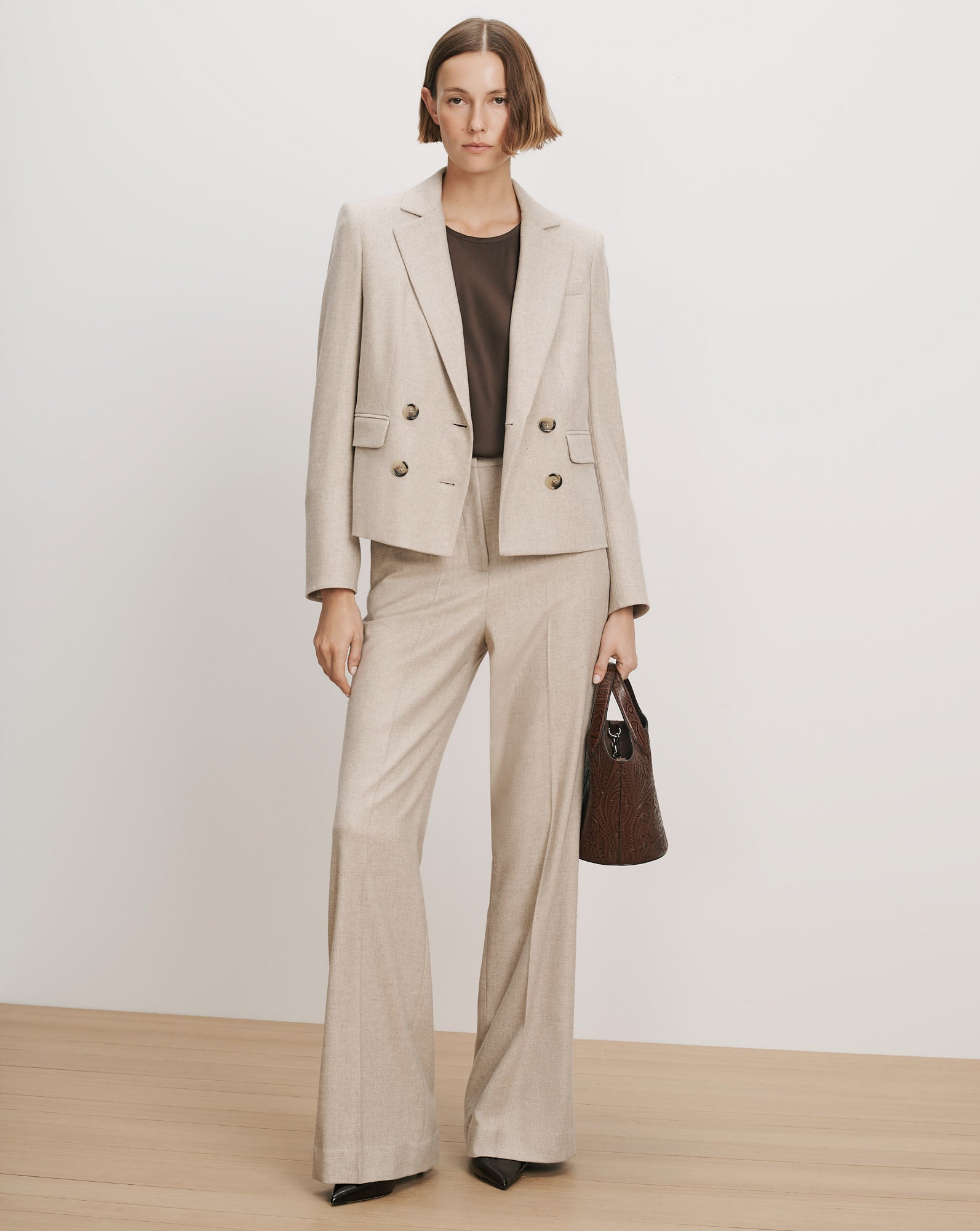 Veronica Beard Beige wool double-breasted blazer and wide-leg trousers.