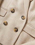 Veronica Beard Beige double-breasted blazer with tortoise buttons.