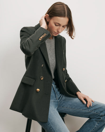 Veronica Beard Dark green double-breasted blazer with gold buttons.