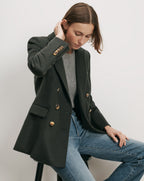 Veronica Beard Dark green double-breasted blazer with gold buttons.