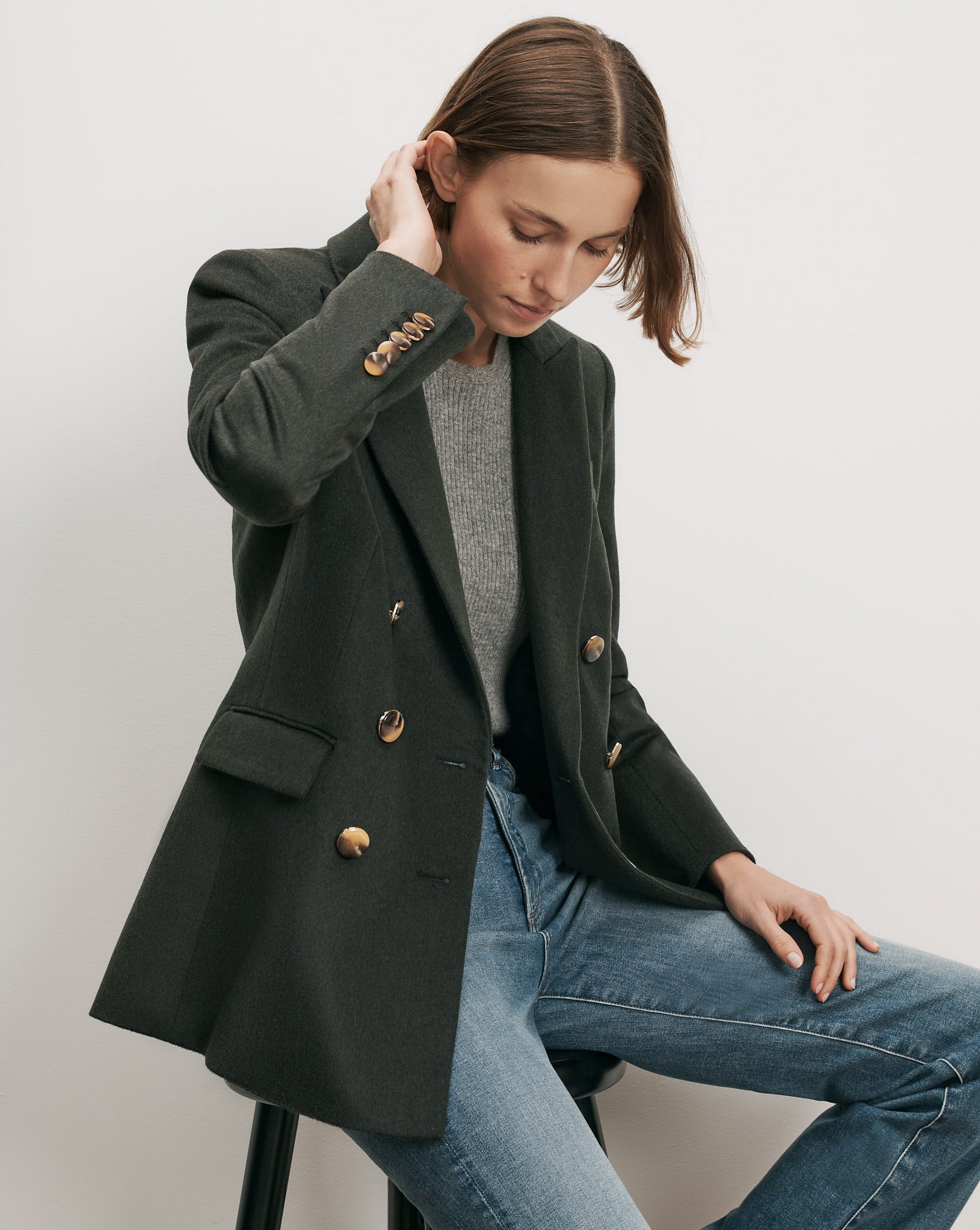 Veronica Beard Dark green double-breasted blazer with gold buttons.