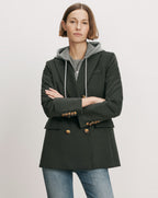 Veronica Beard Dark green double-breasted blazer with gold buttons.