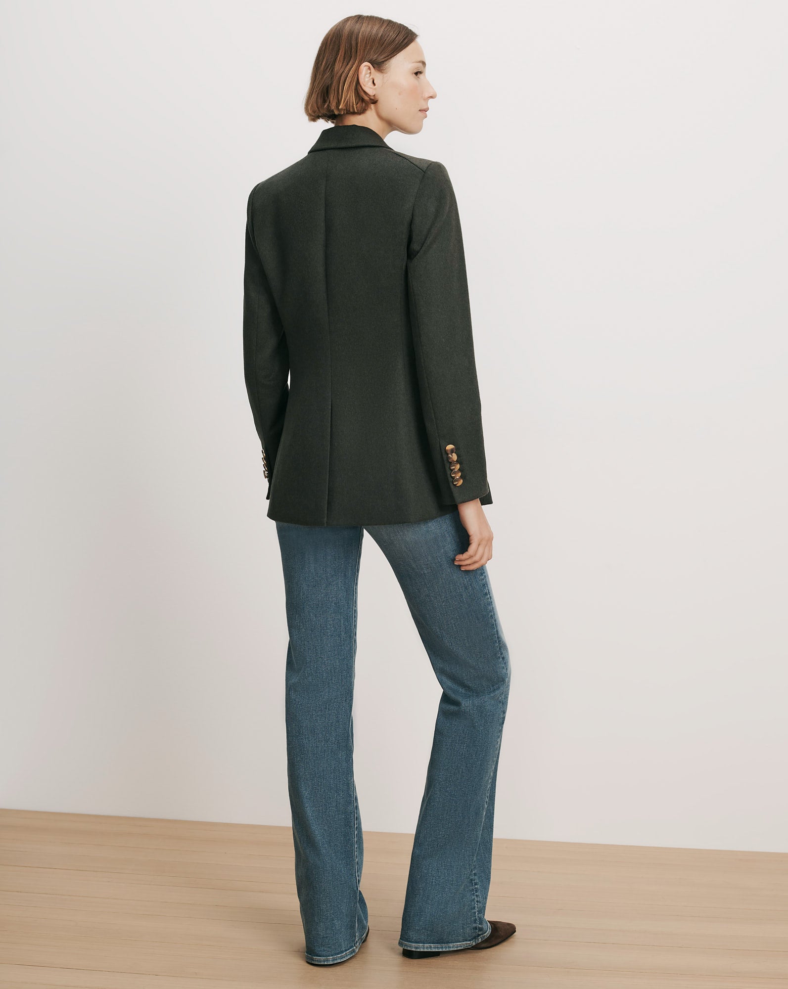 Veronica Beard Dark green wool blazer with brass buttons.