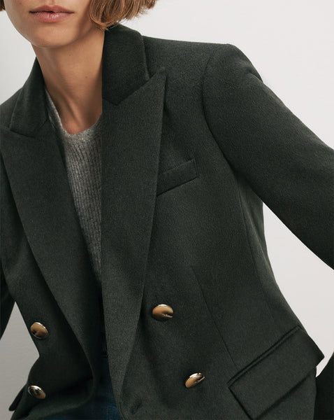 Veronica Beard Dark green double-breasted wool blazer with gold buttons.