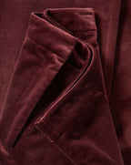 Veronica Beard Burgundy velvet trousers with a tailored waist.