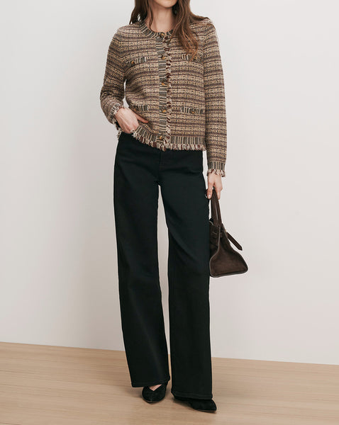 Veronica Beard Brown tweed cardigan and black wide-leg trousers.