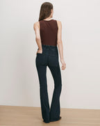 Veronica Beard Dark wash flare jeans and brown ribbed tank top.