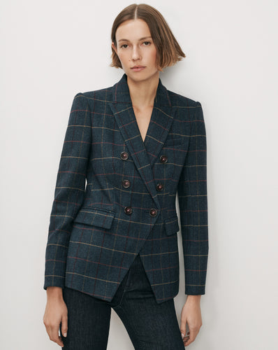 Veronica Beard Navy plaid double-breasted blazer with brown buttons.