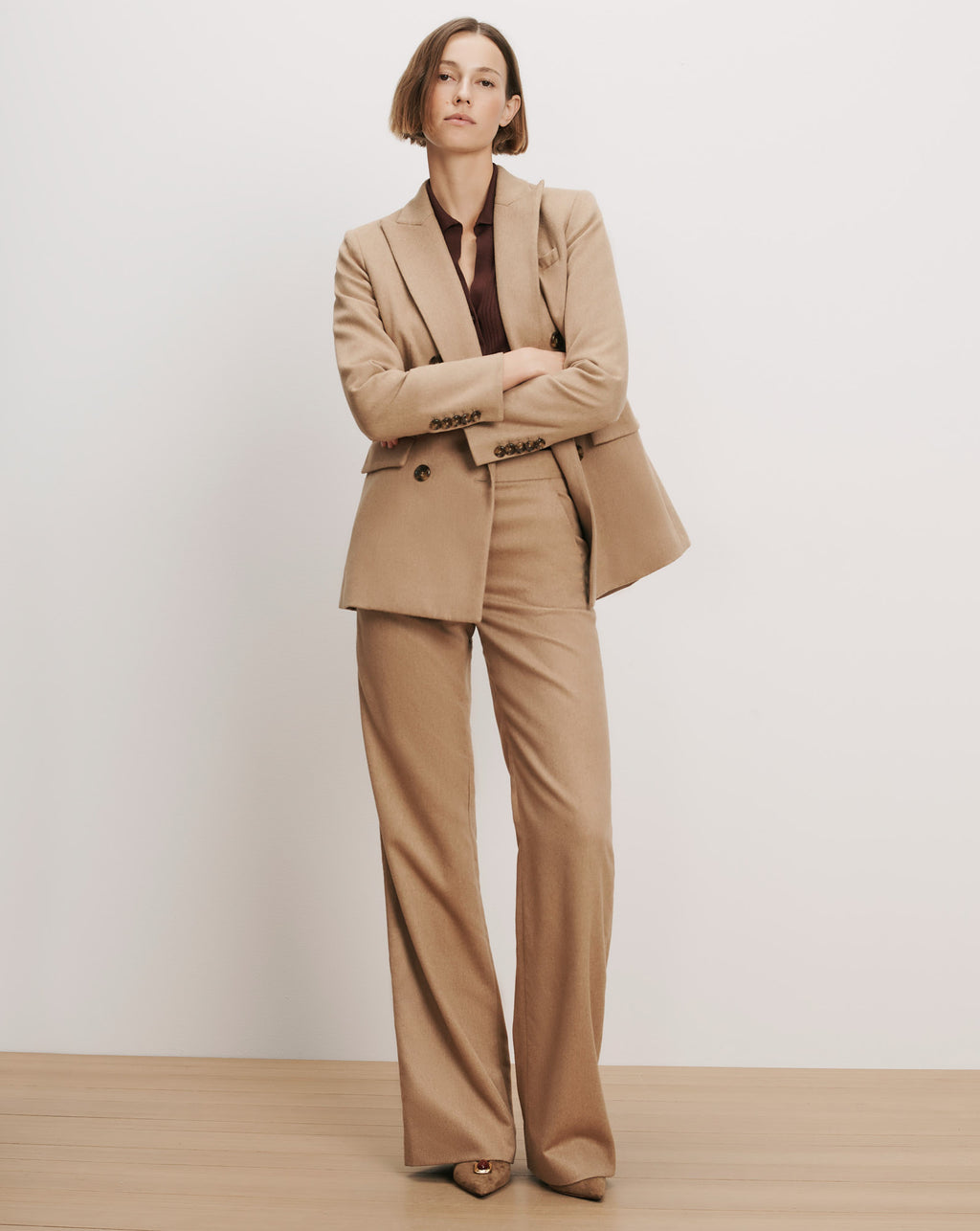 Veronica Beard Tan wool suit with double-breasted blazer and wide-leg pants.