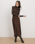 Veronica Beard Brown long-sleeve top and floral maxi skirt.