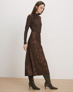 Veronica Beard Brown long-sleeve turtleneck and brown floral jacquard midi skirt.