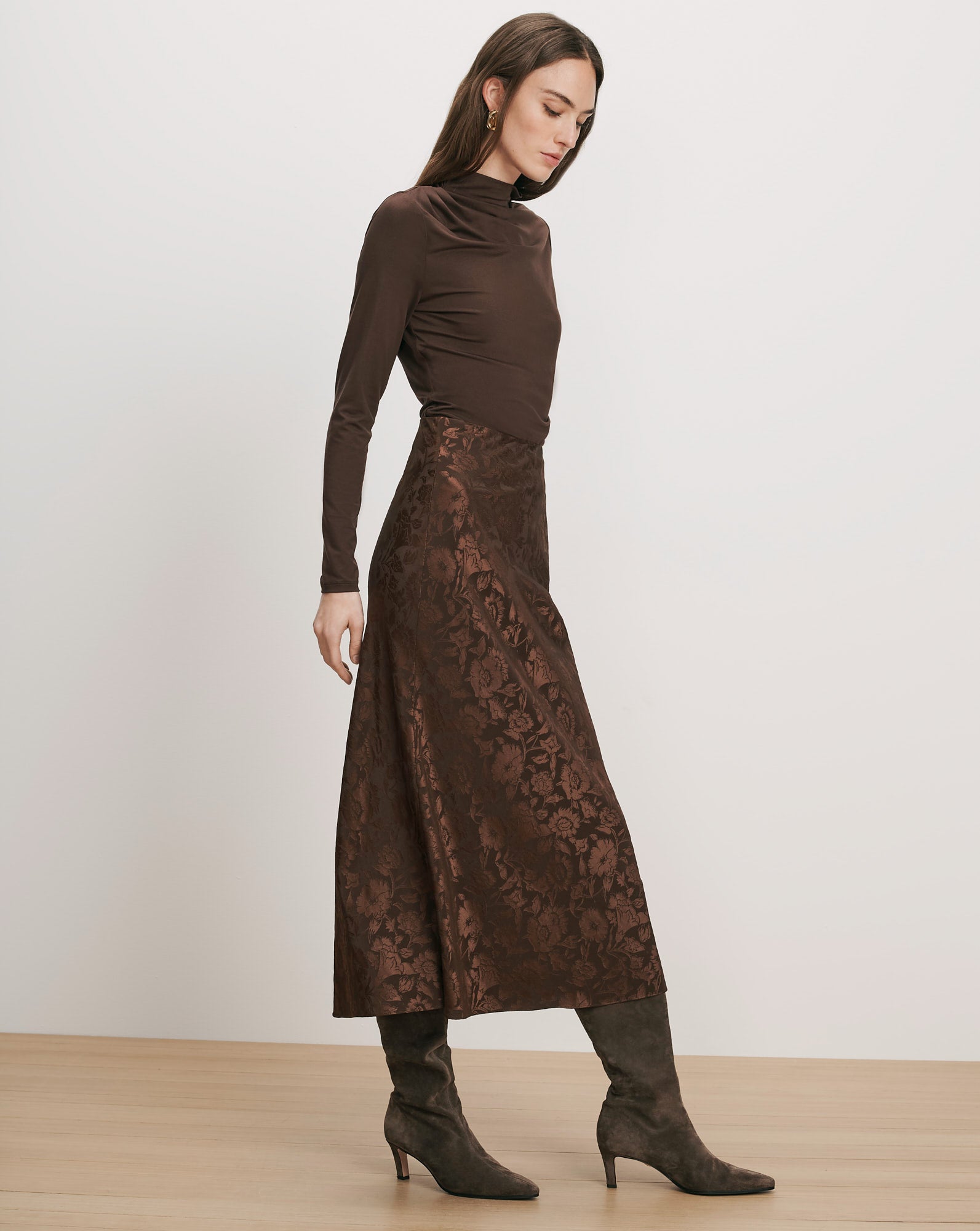 Veronica Beard Brown long-sleeve turtleneck and brown floral jacquard midi skirt.