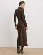 Veronica Beard Brown long-sleeve turtleneck dress with floral jacquard skirt.