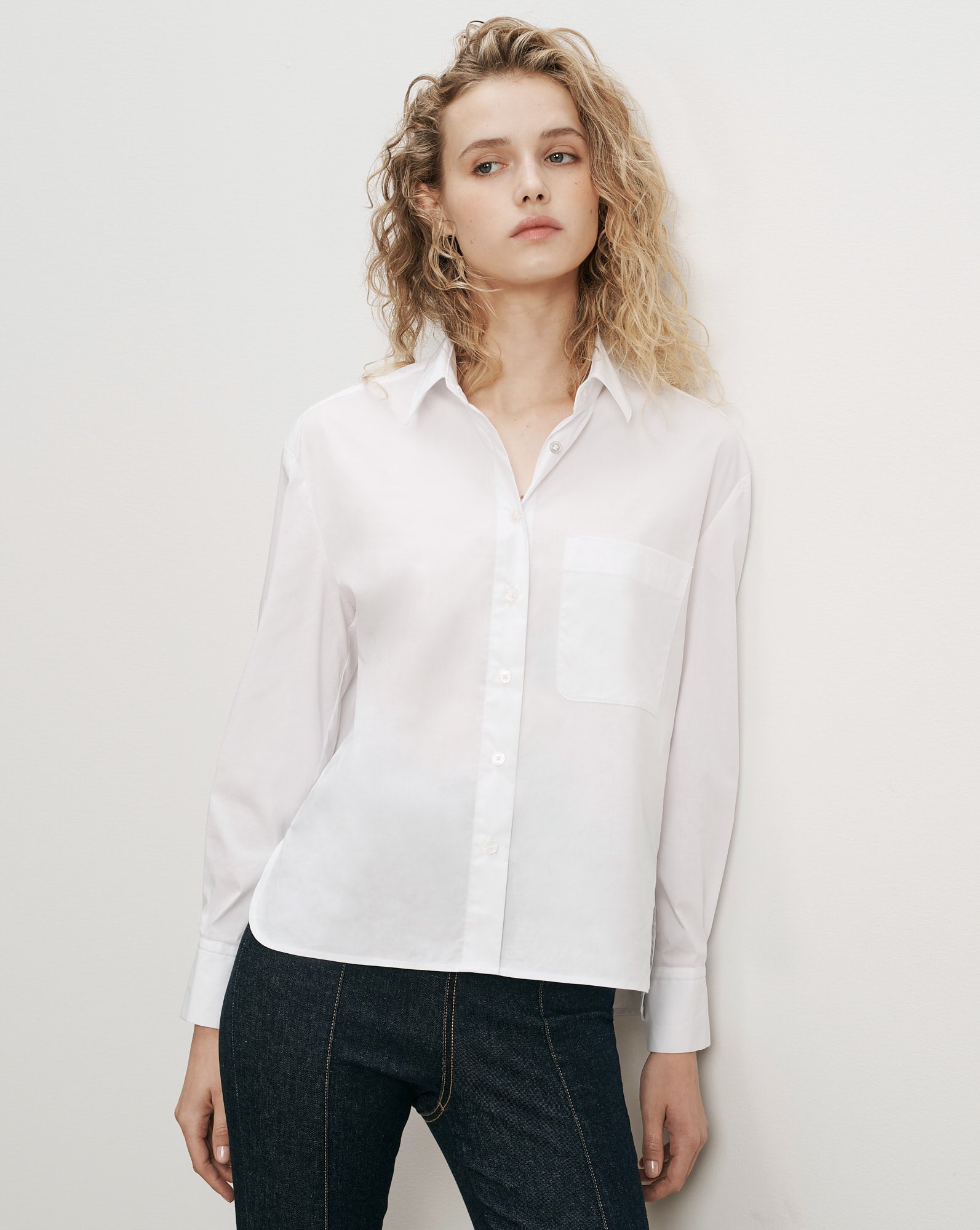 Veronica Beard White cotton button-up shirt with chest pocket.