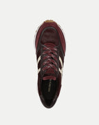 Veronica Beard Burgundy leather and calf hair sneaker.