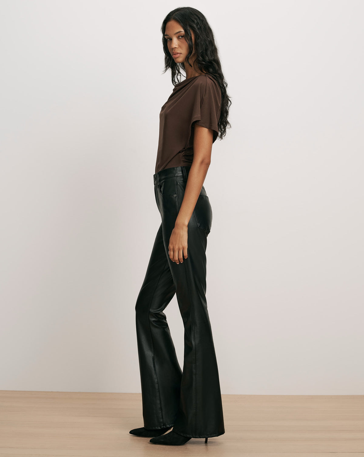 Veronica Beard Gray turtleneck sweater, black leather flared pants