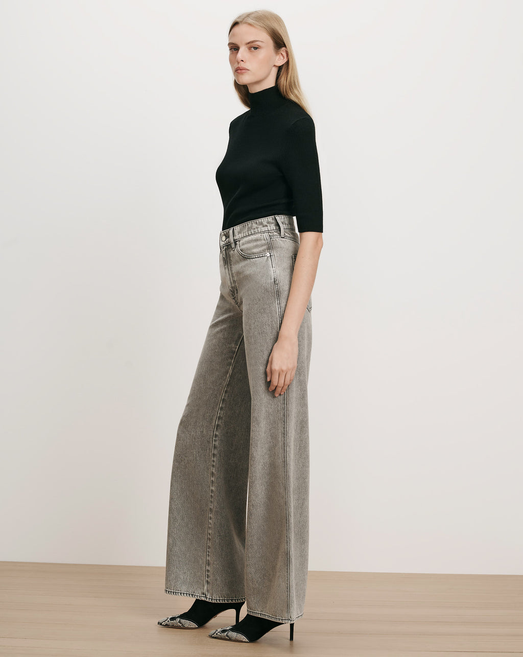 Veronica Beard Black ribbed turtleneck, gray wide-leg jeans