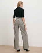 Veronica Beard Black ribbed turtleneck top, gray wide-leg jeans