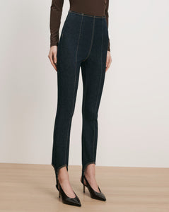 Veronica Beard Dark wash denim stirrup leggings with contrast stitching.