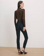 Veronica Beard Brown turtleneck top and dark wash denim stirrup pants
