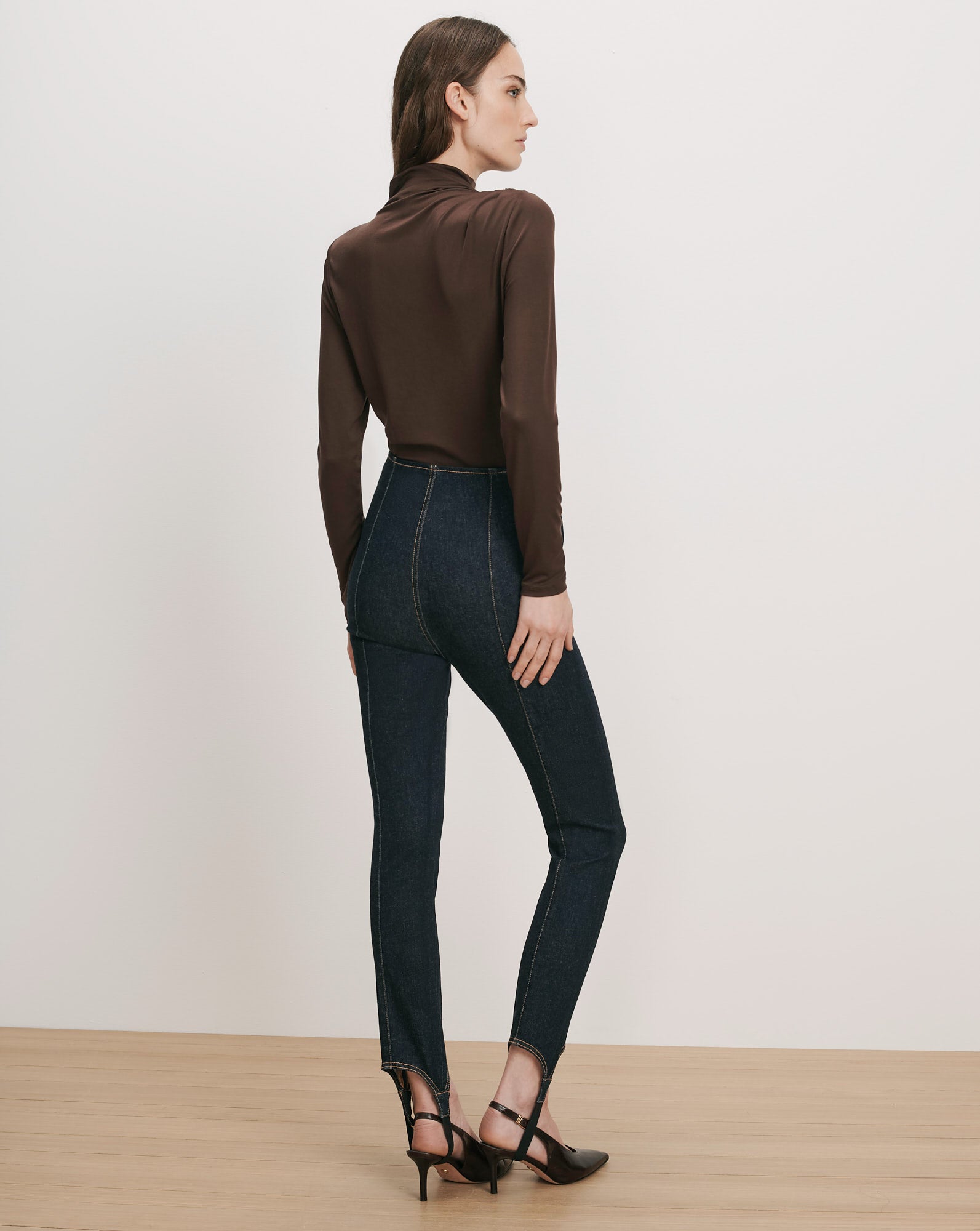 Veronica Beard Brown turtleneck top and dark wash denim stirrup pants