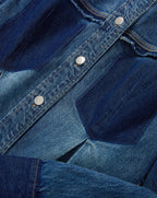 Veronica Beard Blue denim shirt with contrasting dark blue panels.