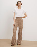 Veronica Beard White t-shirt, brown knit flared pants.