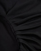 Veronica Beard Black ruched dress fabric detail.