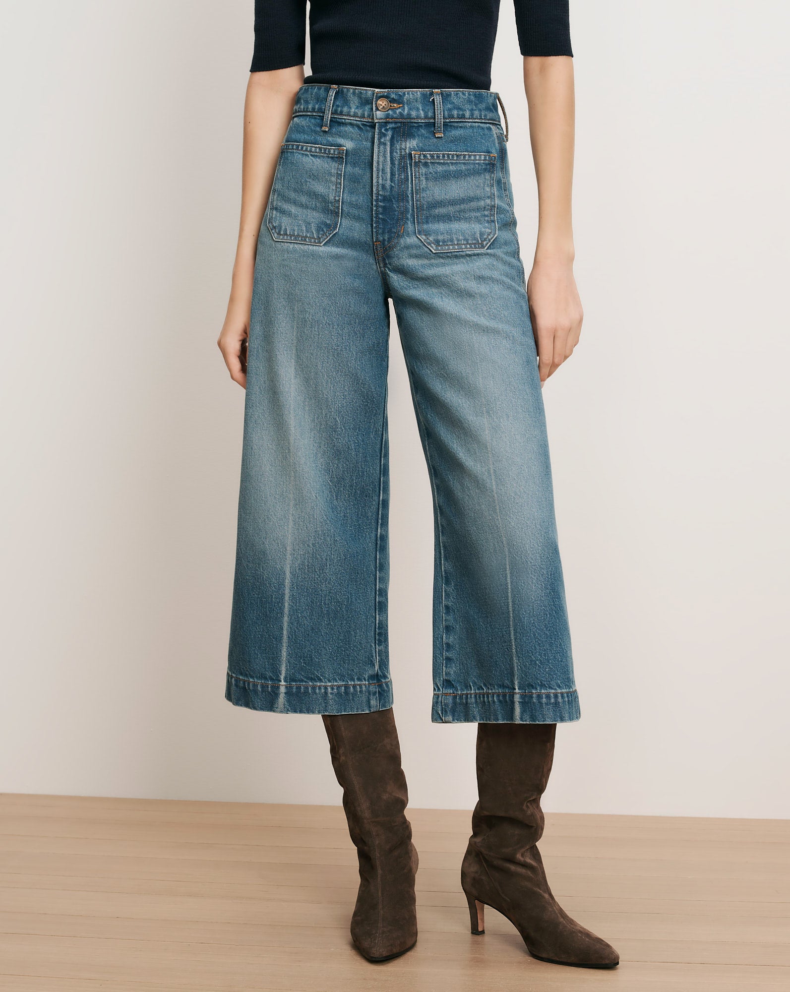 Veronica Beard Blue denim wide-leg cropped jeans with patch pockets.