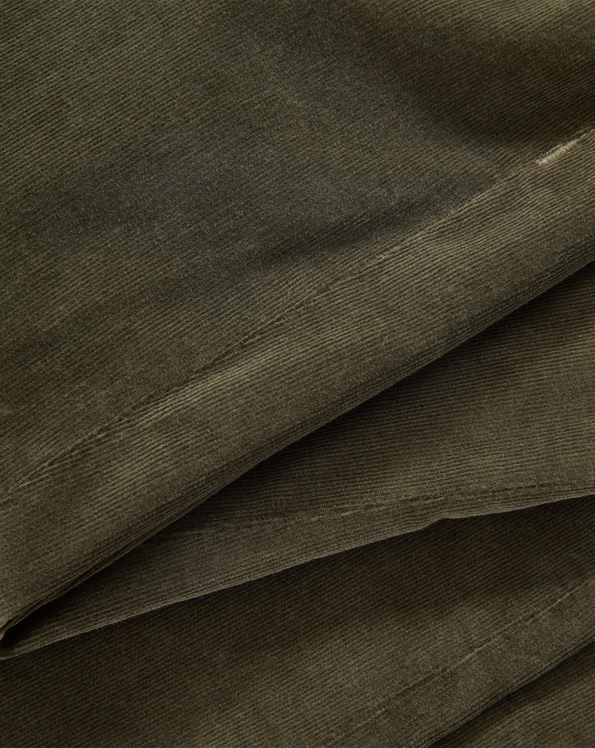 Veronica Beard Olive green corduroy fabric with textured ribbed design.