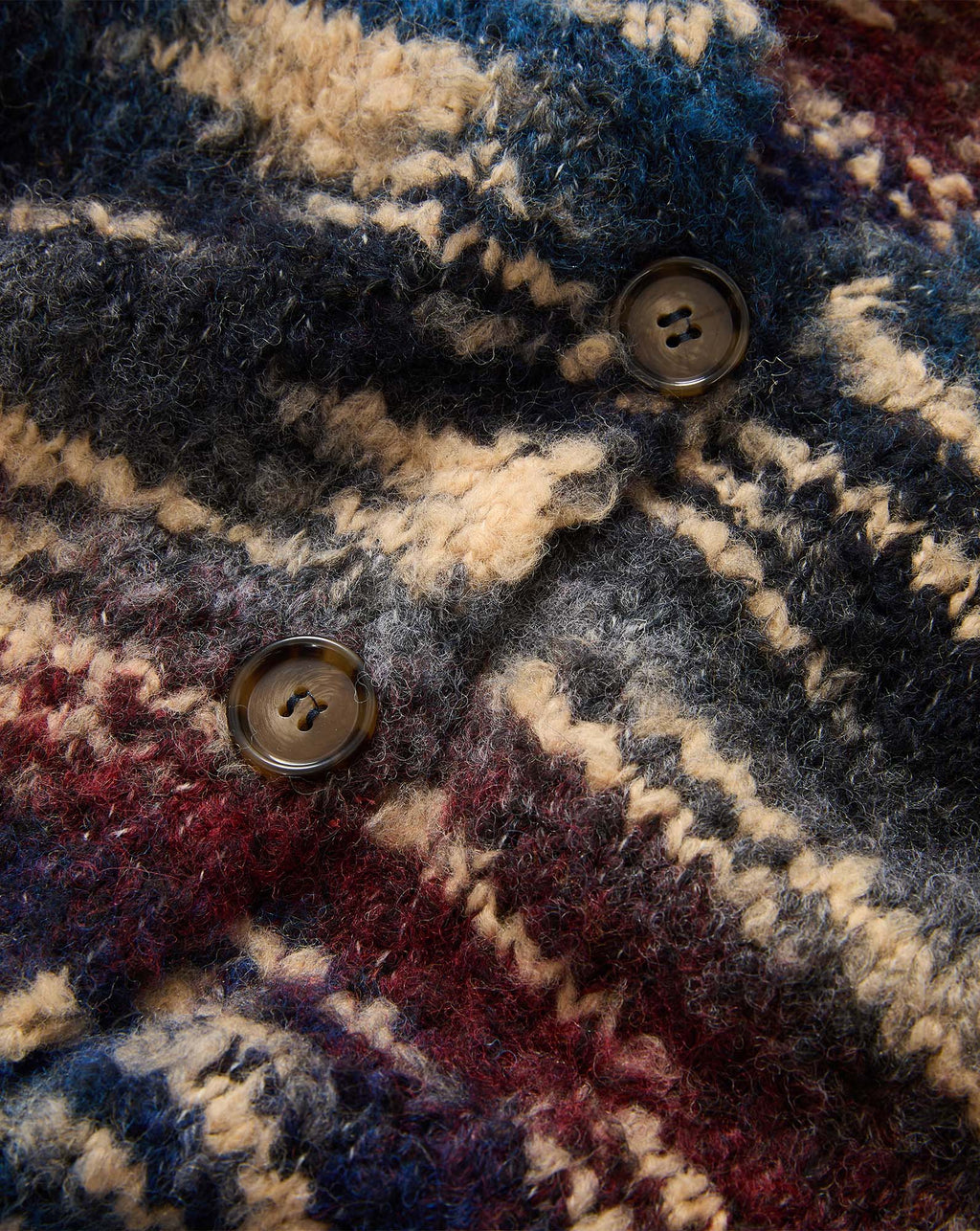 Veronica Beard Multi-colored knit cardigan with brown buttons.
