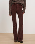 Veronica Beard Brown corduroy flare pants with patch pockets.