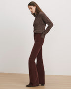 Veronica Beard Brown knit sweater and brown corduroy flare pants.
