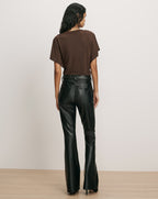 Veronica Beard Brown t-shirt and black faux leather pants.