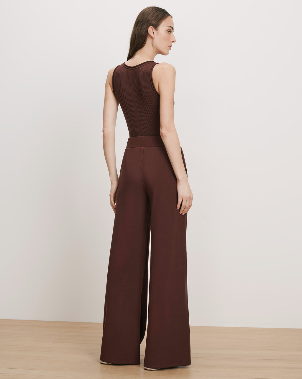 Veronica Beard Brown ribbed tank top and wide-leg pants.